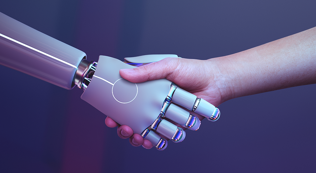 Poignée de main entre une main humaine et une main robotique, symbolisant la collaboration entre l’humain et l’intelligence artificielle. - Article de blog Eventdrive